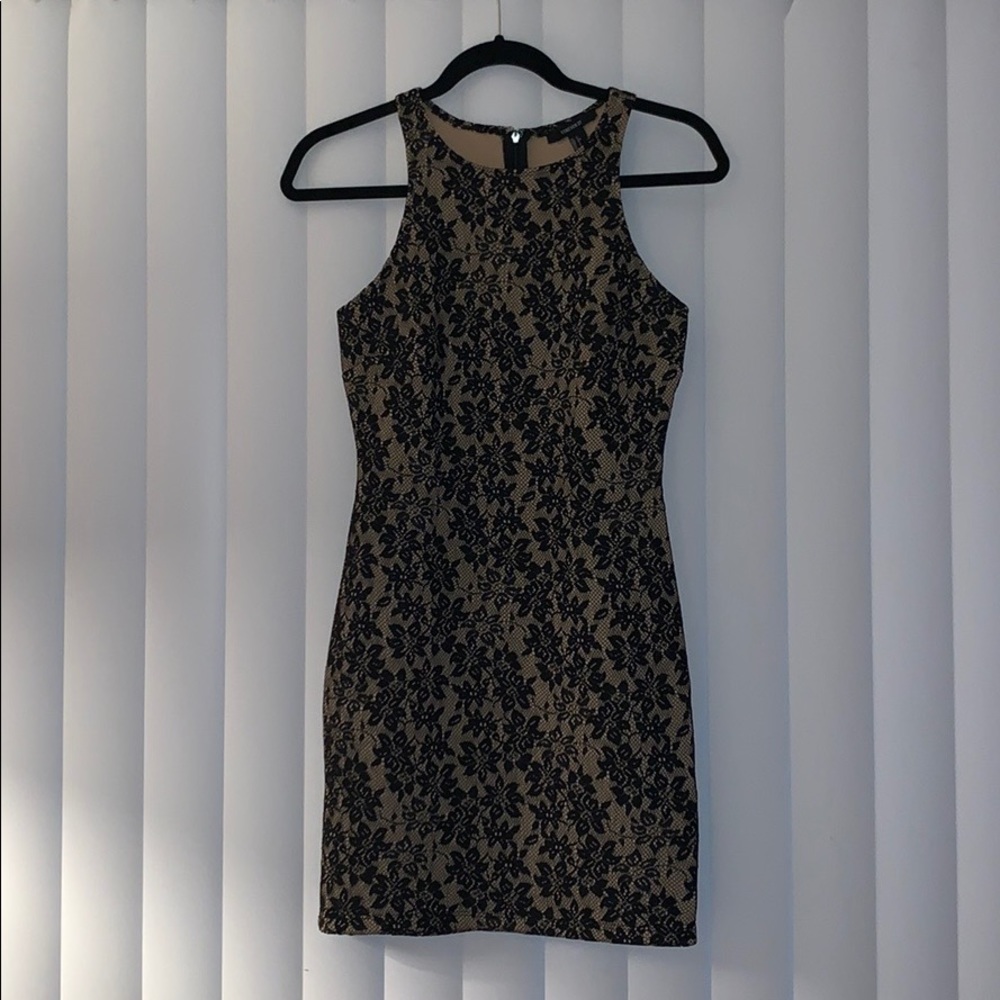 Tight fitting formal dress. Black and Tan lace